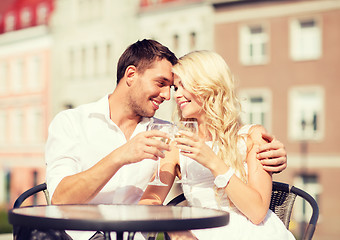 Image showing couple drinking wine in cafe