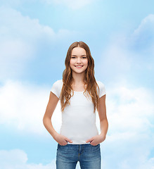 Image showing smiling teenager in blank white t-shirt