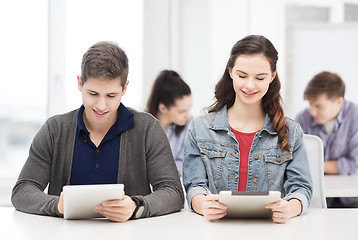 Image showing students looking at tablet pc in lecture at school