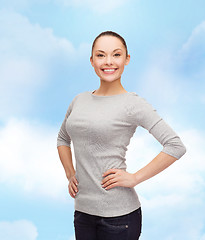 Image showing smiling asian woman over white background