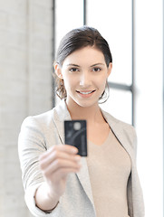 Image showing happy woman with credit card