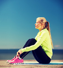 Image showing woman doing sports outdoors