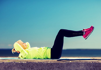 Image showing woman doing sports outdoors