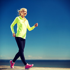 Image showing woman doing sports outdoors