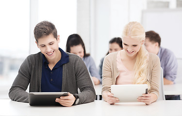 Image showing students looking at tablet pc in lecture at school