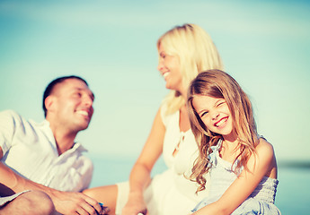 Image showing happy family having a picnic