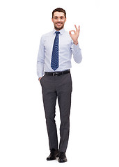 Image showing handsome businessman showing ok-sing