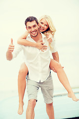 Image showing couple having fun on the beach