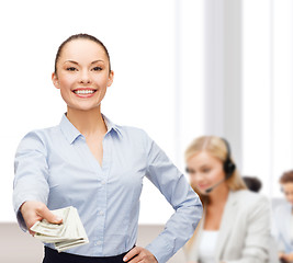 Image showing young businesswoman with dollar cash money