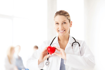 Image showing female doctor with heart