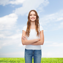 Image showing smiling teenager in blank white t-shirt