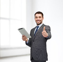 Image showing smiling buisnessman with tablet pc computer