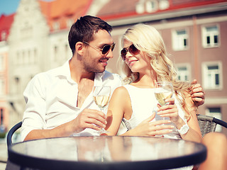 Image showing couple drinking wine in cafe