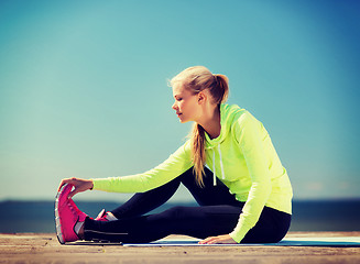 Image showing woman doing sports outdoors