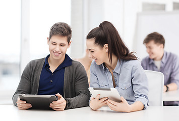 Image showing students looking at tablet pc in lecture at school