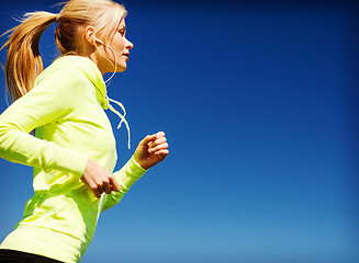 Image showing woman doing running outdoors