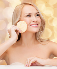 Image showing beautiful woman with sponge