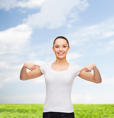 Image showing smiling woman in blank white t-shirt