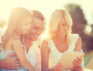 Image showing happy family with tablet pc taking picture