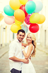 Image showing couple with colorful balloons