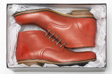 Image showing new red shoes in box