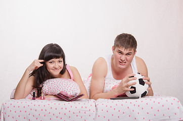 Image showing Male football fan, wife hates this game