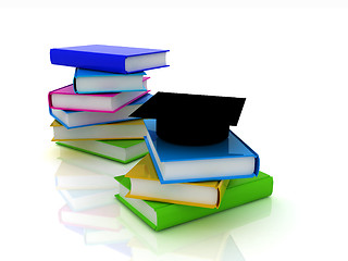 Image showing Graduation hat with books