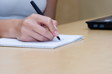 Image showing woman writing