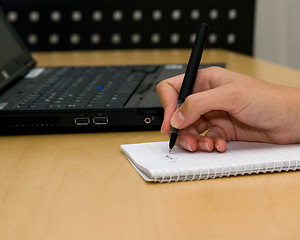 Image showing woman writing