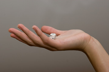 Image showing woman holding dice