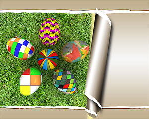 Image showing background of flower of easter eggs on the grass, with torn pape