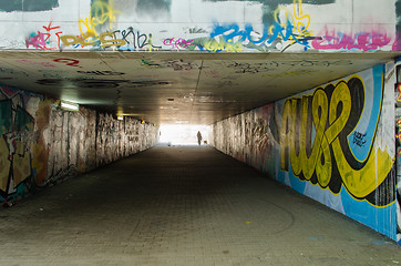 Image showing underground crossing with graffiti smeared walls 