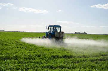 Image showing Tractor spray fertilize field pesticide chemical 