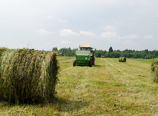 Image showing Straw bales agricultural machine gather hay 