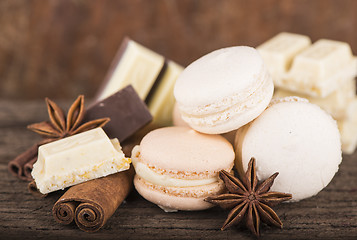 Image showing Chocolate macaroons with pieces of white and black chocolate