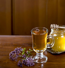Image showing Still life from medicinal herbs, honey, herbal tea