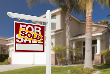 Image showing Sold Home For Sale Sign in Front of New House