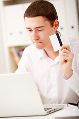 Image showing man holding credit card