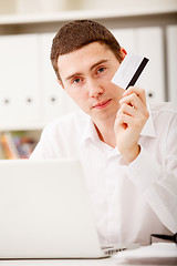 Image showing man holding credit card