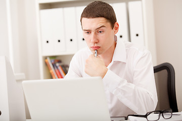 Image showing man thinking in office