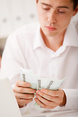 Image showing man counting money