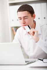 Image showing man holding credit card