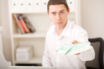 Image showing man holding euro money