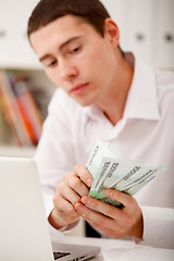 Image showing man counting money
