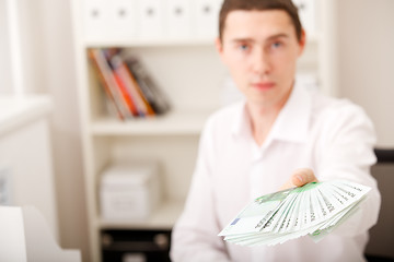 Image showing man holding euro money