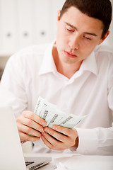 Image showing man counting money