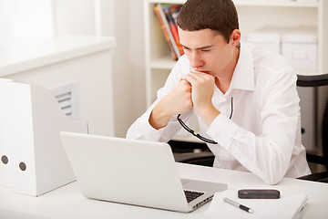 Image showing man thinking in office