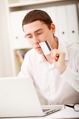 Image showing man holding credit card