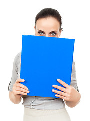 Image showing business woman with a blue binder