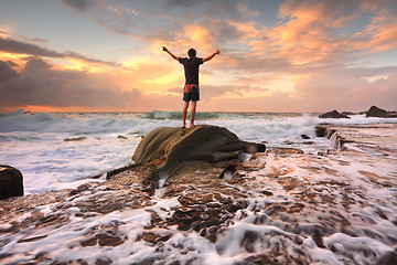 Image showing Zest Life, Praise God, Love Nature, Sunrise turbulent seas arms 